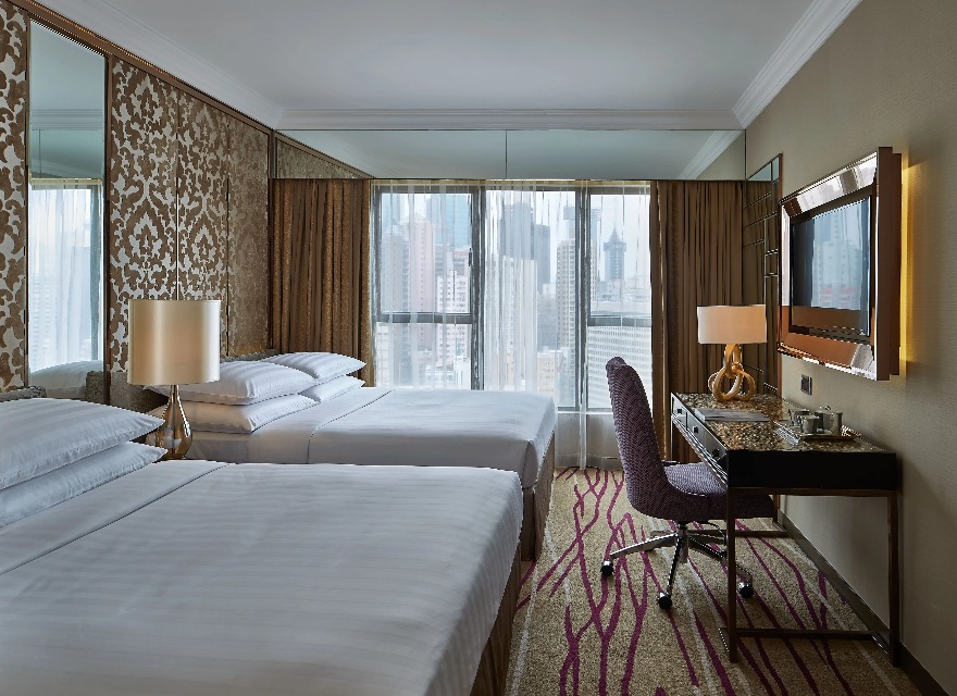 Two queen beds in the Deluxe Family Quad Room at Dorsett Wanchai