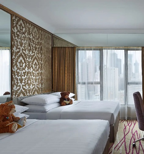 Two queen beds in the Deluxe Family Quad Room at Dorsett Wanchai