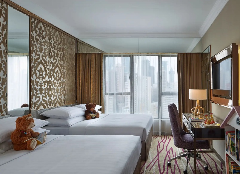 Two queen beds in the Deluxe Family Quad Room at Dorsett Wanchai