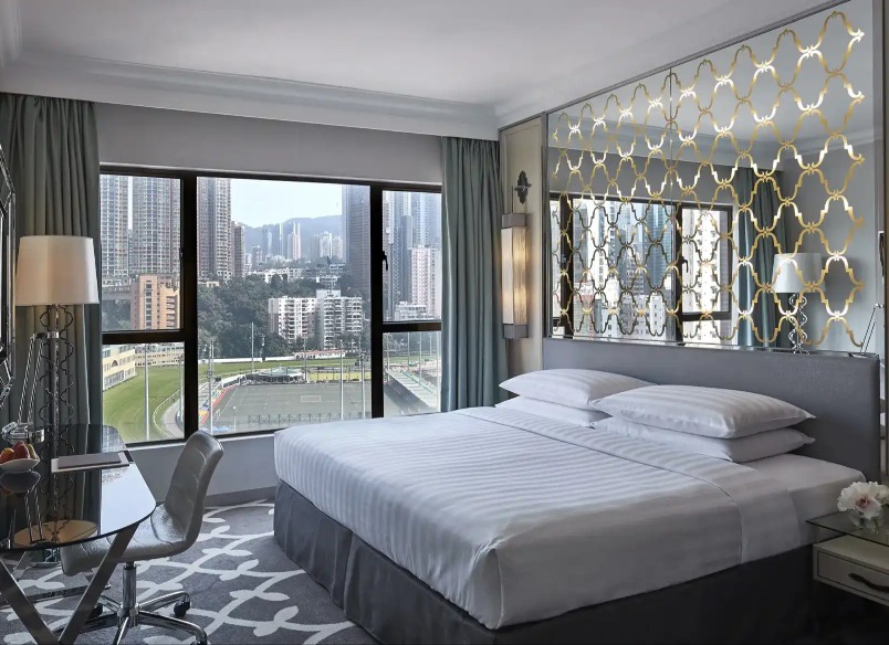 King-size bed in the Premier Course View Room at Dorsett Wanchai