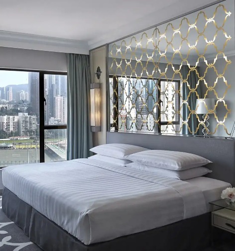 King-size bed in the Premier Course View Room at Dorsett Wanchai