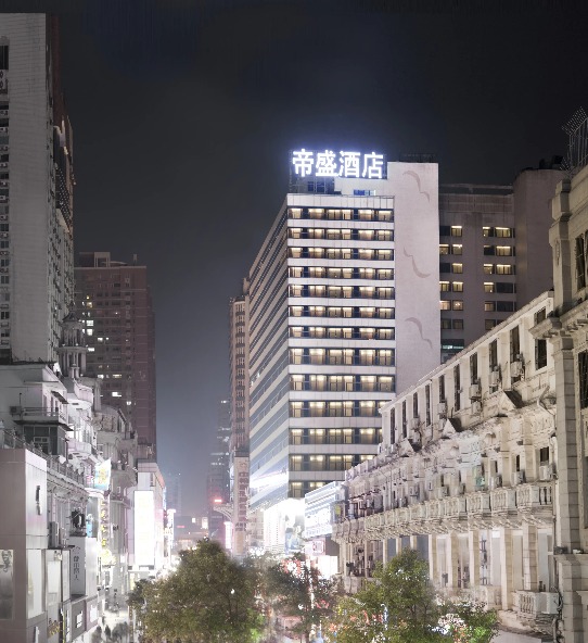 Exterior of Dorsett Wuhan Hotel in the night.